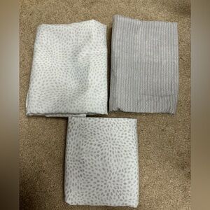 Set of 3 HALO bassinet fitted sheets. One of them has a stain.